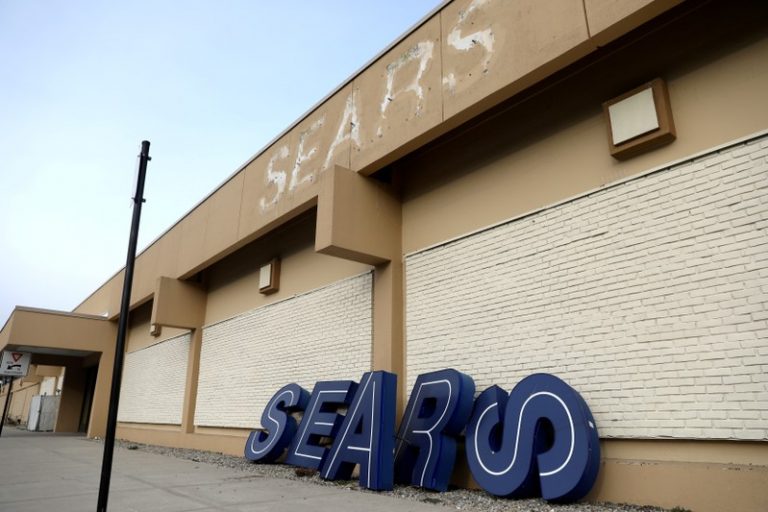FILE PHOTO: A dismantled sign sits leaning outside a Sears department store one day after it closed as part of multiple store closures by Sears Holdings Corp in the United States in Nanuet, New York, U.S., January 7, 2019. REUTERS/Mike Segar