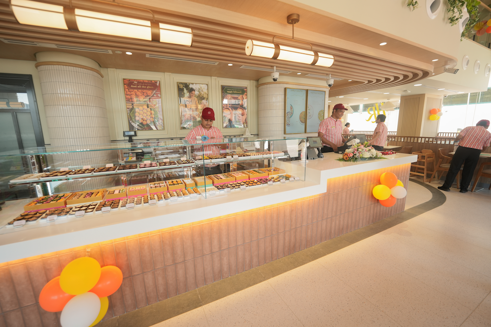 The new outlet has been thoughtfully designed to present a contemporary interpretation of Indian culinary heritage. It brings together Haldiram’s full spectrum of offerings — from its signature handcrafted mithais and savoury snacks to a diverse all-vegetarian dining experience — along with a curated retail and premium gifting section catering to both festive and everyday occasions. Building on the success of its first Dubai store launched in 2025, Haldiram’s has seen strong and consistent customer engagement, particularly during key festive periods. This second outlet reflects the brand’s intent to scale thoughtfully while maintaining the quality, consistency, and trust it has built over decades. “Dubai has always been a strategic market for us, and the response to our first store reinforced the deep connection customers have with the Haldiram’s brand,” said Divya Kowshik, Head of Business-International QSRs. “With our presence on Sheikh Zayed Road, we are not only expanding access but also elevating the experience in line with the expectations of a global audience.” The design and positioning of the store reflect evolving consumer preferences in the UAE, where traditional flavours are increasingly being experienced in modern, design-led environments. The result is a space that is both familiar and elevated, catering to a diverse and international customer base. “Our expansion in Dubai is a reflection of our belief in the market, the strength of its leadership, and the long-term opportunity that the UAE continues to offer. We are here to grow, contribute, and build something meaningful over time.”